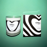 Chill Candle features clear vase with black and white modern heart design. Box replicates the heart pattern on the front. All black and white modern design. 