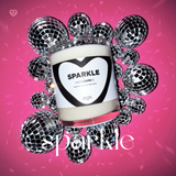 "SPARKLE" candle by Fruitloots! This gorgeous candle sits in a bed of tiny disco balls as it sparkles all around the image. 