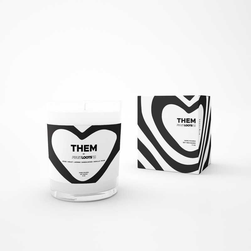 THEM Candle features a clear vase with black and white modern heart design. Box replicates the heart pattern on the front. All black and white modern design.