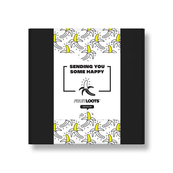 Happy Vibes Gift Wrap features a black, white and yellow sleeve with graphic modern banana. Front card says "Sending you some happy" 